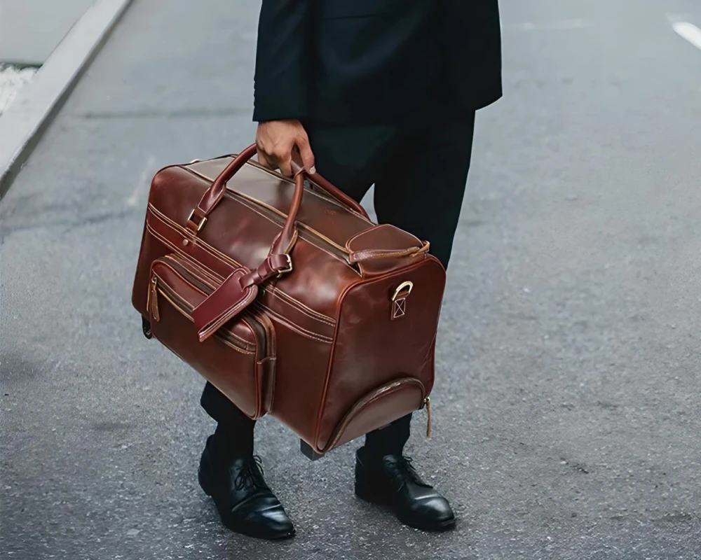 red leather carry on luggage