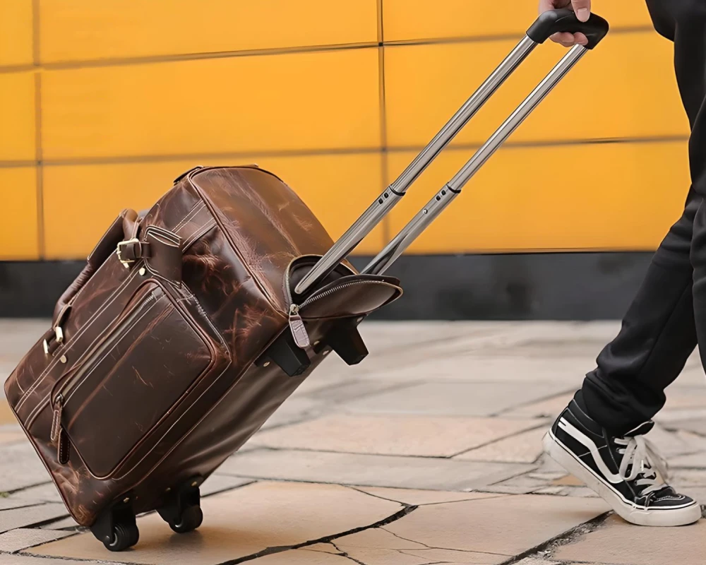 red leather carry on luggage
